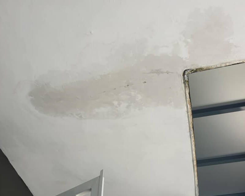 Water damage stain on a ceiling, documented for Nano-G repair assessment.