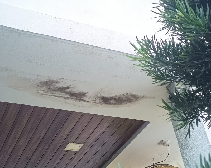 Water damage stain on a white ceiling, showcasing a potential area where Nano-G products could be used for repair or prevention.