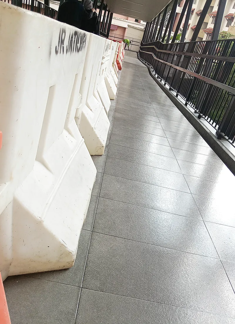 Link Bridge Anti-Slip Project for IJN Hospital used Nanotechnology Anti-Slip Coating to safeguard hospital visitors from rainy or damp slip risks.