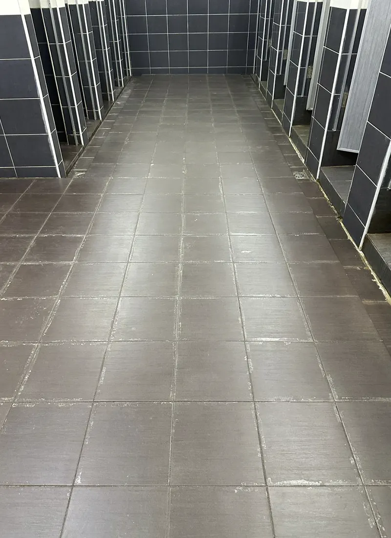 Bathroom Waterproofing Project for Han Chiang Associated School applying waterproofing solution to fix seepage, stains, and surface deterioration from water and chemicals.
